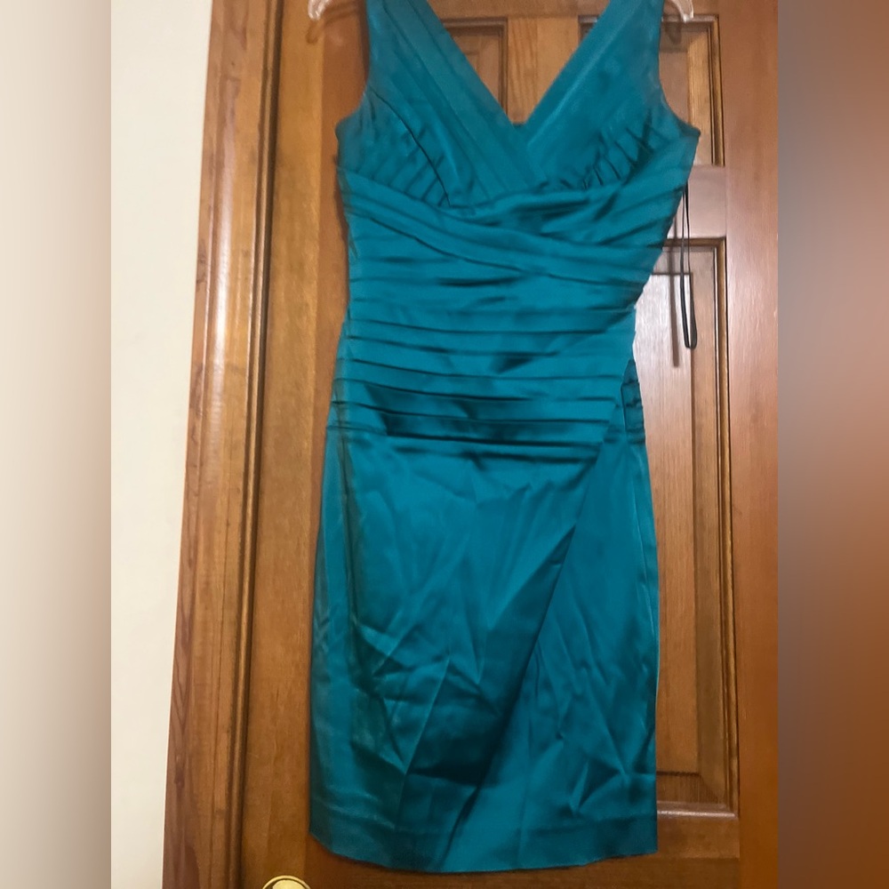 Calvin Klein dress, slight imperfections on the underarms but in good condition